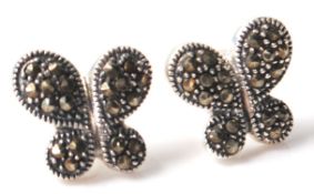 A pair of silver and marcasite earrings in the form of butterflies. 15mm wide. Weighs 4g.