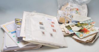 A collection of mixed world stamps dated from early 20th century to recent to include first day