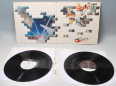 A vinyl long play LP record album by Pink Floyd – The Wall – Original Columbia Records U.S. Press –