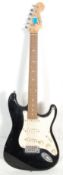 A vintage 90s Squier Strat by Fender Affinity Series Stratocaster electric guitar instrument