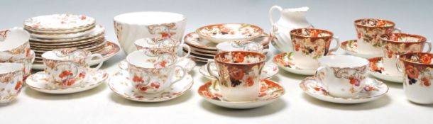 Two vintage English china tea sets to include eight Victorian tea cup trios, creamer jug and creamer