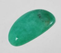 A 20th Century polished jade stone of uncut form. Measures 38mm. 7.6g