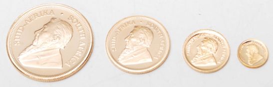 A Kruger fractional 4 coin set 2018 containing a 1/4 oz 22 ct Krugerrand gold coin, 1/10 oz 22 ct