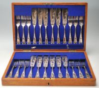 A 19th century Victorian William Hutton & sons silver plated canteen of cutlery comprising of twelve