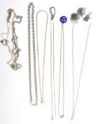 A collection of stamped 925 silver pendant necklaces to include a blue enamelled pendant with