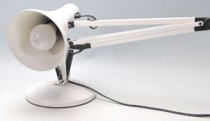 A retro vintage 20th century industrial anglepoise lamp in the manner of Herbert Terry. Raised on