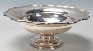 A 1920’s silver hallmarks day tazza dish / bowl having pie crust edges, raised in a circular