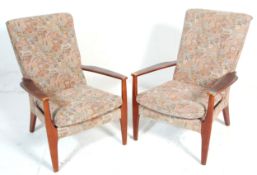 Parker Knoll - A pair of mid century Parker Knoll P.K. 1118 -26 vintage open framed armchairs / easy