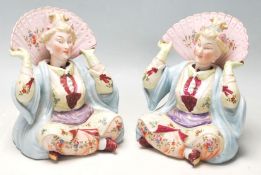 A large pair of Victorian German porcelain nodding figurines in the manner of Meissen, circa 1900