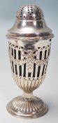 A 20th Century Edwardian style sugar shaker in the shape of a classical urn having a pierced lid and