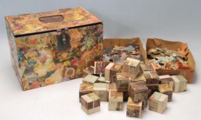 A late 19th century Victorian paper mache decorated box housing a Victorian wooden block puzzle