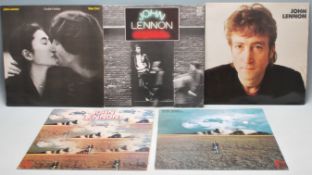 A collection of vinyl long play LP record albums by John Lennon to include Mind Games x 2, Double