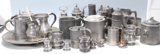 A substantial collection of 20th Century German pewter drinking / mugs / flagons / steins, each