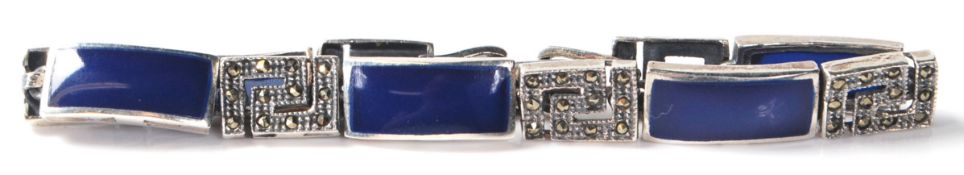 An Art Deco style silver ladies bracelet having marcasite and lapis lazuli decoration. Measure
