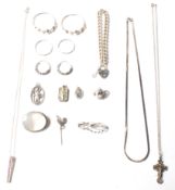 A large collection of hallmarked sterling silver jewellery to include a solid silver bracelet with