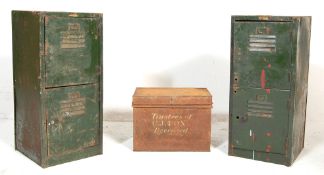 A pair of retro vintage industrial two tier metal factory lockers having vented doors together