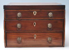 A 19th Century George III mahogany and inlaid desktop / apprentice piece chest of drawers with a