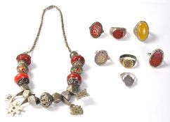 A collection of 20th Century North African / Moroccan jewellery to include three rings set with