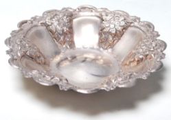 A 20th Century Egyptian silver small bowl / trinket dish having alternate panelled decoration with