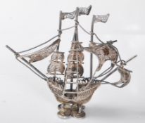 A superb quality silver and enamel sailing ship / galleon having with filigree decoration to the