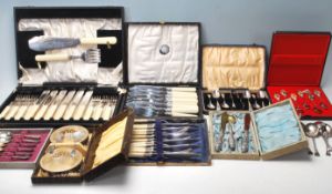 A good collection of vintage mid 20th Century silver plated cutlery sets to include fish knives,
