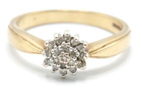 A hallmarked 9ct gold and diamond cluster ring having a cluster of round cut diamonds to the head