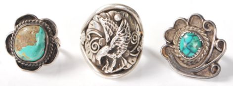 Three Navajo Native American silver rings to include a Spencer Percy eagle ring with foliate
