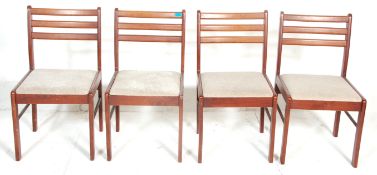 A set of 4 retro mid 20th century vintage teak wood G Plan style dining chairs with upholstered