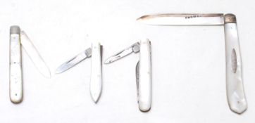A pair of silver and mother of pearl penknife with mother of pearl handles and silver hallmarked