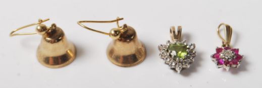A pair of hallmarked 9ct gold earrings in the form of bells (assay marked for London), a 9ct gold