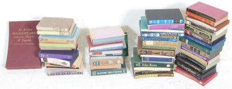 A collection of 30+ Folio Society hardcovers books to include The Odes of Horace, The Three