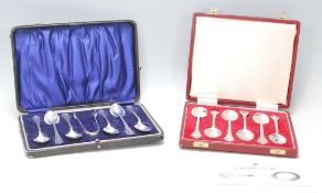 Two England hallmarked silver teaspoons sets in original cases to include a reproductions set of