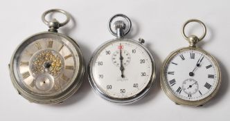 A pair of early 20th century Open face pocket watches, having white metal cases and white enamel