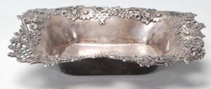 A good early 20th century sterling silver dish by Theodore B. Starr with raised floral decoration to
