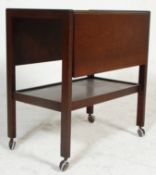 A vintage retro 20th Century oak butlers drop flap hostess / butlers drinks trolley. The trolley