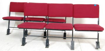 A pair of retro vintage 20th century cinema folding seats comprising of two rows of three seats