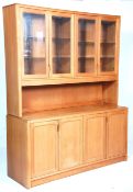 A vintage retro 20th Century teak wood wall display cabinet dresser the base having two sets of twin