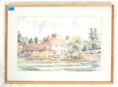 A mid 20th century watercolour painting depicting a cottage next to a lake with trees and boat.
