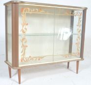 A 1930's Art Deco display cabinet / vitrine of small proportions with double sliding doors,