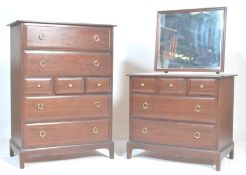 A vintage mid century Stag minstrel mahogany bedroom suite. Comprising the dressing table having a