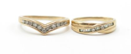 To vintage 9ct gold rings to include one crossover ring channel set with blue and white stones (