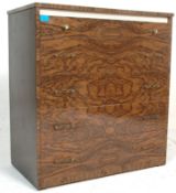 A retro vintage 1950s figured melamine chest of dr