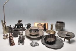 A good collection of assorted  brass, copper, pewter items to include cast metal table lighter,