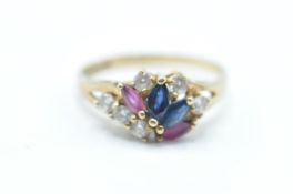A hallmarked 9ct gold ladies cluster ring being set with blue and pink marquise cut stones with