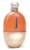 A silver 20th Century GW&g  hallmarked drink flask with leather cover and glass body, having bayonet