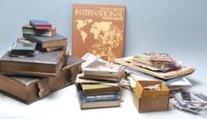 A large quantity early and late 20th Century of ephemera to include glass magic lantern slides, 19th