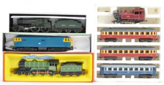 A COLLECTION OF HORNBY AND LIMA LOCOMOTIVE RAIL SETS