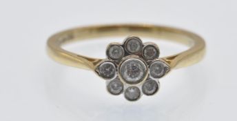 A Hallmarked 9ct Gold & Diamond Cluster Ring