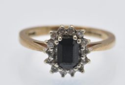 A Hallmarked 9ct Gold Sapphire & Diamond Cluster Ring