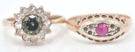 A 9ct gold ring inset with white and red stones (s